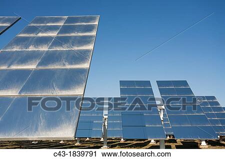 Rows of solar panels, so-called heliostats, generating energy at one of Europe's biggest solar energy fields in the Tabernas Desert, Europe's only true desert Almer? a province, Andaluc? a, Spain View Large Photo Image Stock Image - Rows of solar panels, so-called heliostats, generating energy at one of Europe's biggest solar energy fields in the Tabernas Desert, Europe's only true desert Almer? a province, Andaluc? a, Spain. Fotosearch
