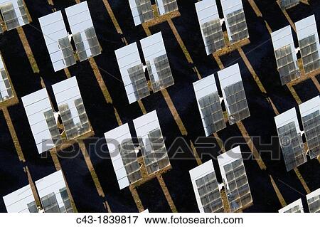 Rows of solar panels, so-called heliostats, generating energy at one of Europe's biggest solar energy fields in the Tabernas Desert, Europe's only true desert Almer? a province, Andaluc? a, Spain View Large Photo Image Stock Photo - Rows of solar panels, so-called heliostats, generating energy at one of Europe's biggest solar energy fields in the Tabernas Desert, Europe's only true desert Almer? a province, Andaluc? a, Spain. Fotosearch