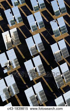 Rows of solar panels, so-called heliostats, generating energy at one of Europe's biggest solar energy fields in the Tabernas Desert, Europe's only true desert Almer? a province, Andaluc? a, Spain View Large Photo Image Stock Photography - Rows of solar panels, so-called heliostats, generating energy at one of Europe's biggest solar energy fields in the Tabernas Desert, Europe's only true desert Almer? a province, Andaluc? a, Spain. Fotosearch