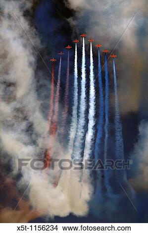 Royal Air Force Aerobatic Team Red Arrows at the Royal International Air Tattoo RIAT Air Show July 2009 View Large Photo Image Picture - Royal Air Force Aerobatic Team Red Arrows at the Royal International Air Tattoo RIAT Air Show July 2009. Fotosearch