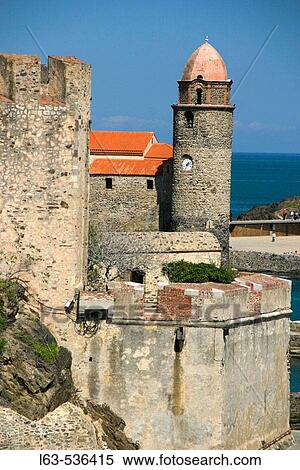Stock Photography - Royal Castle and Notre Dame des Anges church. Collioure. Languedoc-Roussillon. France. Fotosearch