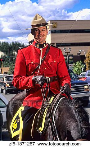 Royal man on horse in uniform in Whitehorse Yukon Canada View Large Photo Image Stock Photo - Royal man on horse in uniform in Whitehorse Yukon Canada. Fotosearch