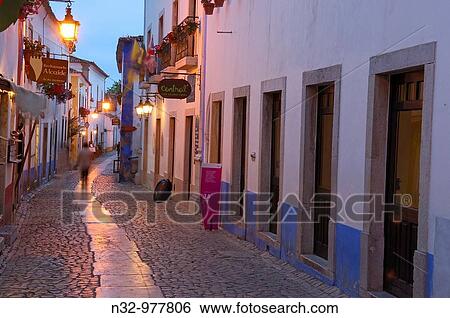 Rua Direita at dusk, Obidos, Leiria district, Portugal View Large Photo Image Stock Photograph - Rua Direita at dusk, Obidos, Leiria district, Portugal. Fotosearch