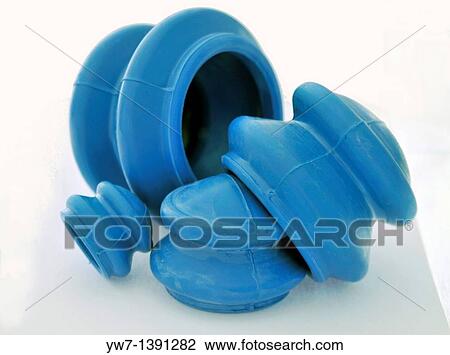 Stock Image - Rubber cupping jars for alternative medicine. Fotosearch