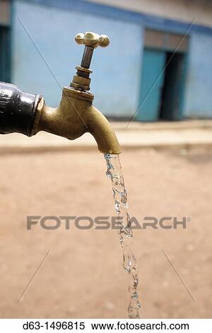 Stock Photography - Runing tap, Home of Compassion for the sick and needy, Kigera village, near Musoma, Tanzania. Fotosearch