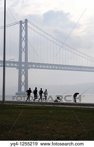 Running along the river Tejo, Lisbon, Portugal View Large Photo Image Stock Photo - Running along the river Tejo, Lisbon, Portugal. Fotosearch