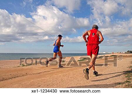 Stock Image - running, Canet de Mar, Catalonia, Spain.. Fotosearch
