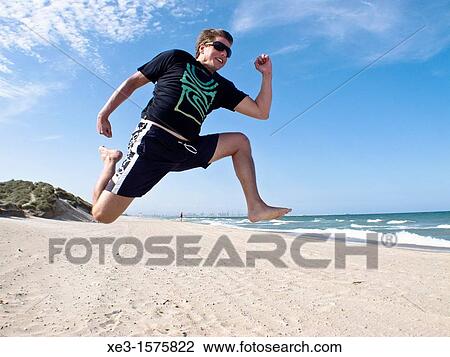 Running jump View Large Photo Image Stock Image - Running jump. Fotosearch