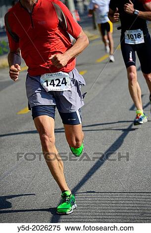 running male athlets, 25th International Geneva Triathlon, on July 21, 2013, Quai du Mont-Blanc, Geneva, Switzerland. View Large Photo Image Stock Photography - running male athlets, 25th International Geneva Triathlon, on July 21, 2013, Quai du Mont-Blanc, Geneva, Switzerland.. Fotosearch