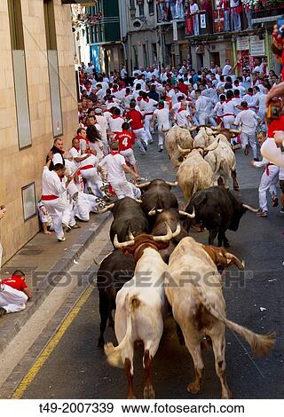 Stock Photo - running of the bulls in San Fermin in Pamplona (Navarre).. Fotosearch