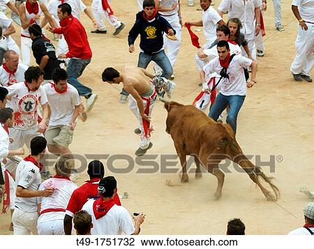 Stock Image - running of the bulls in San Fermin Pamplona 2012. Fotosearch
