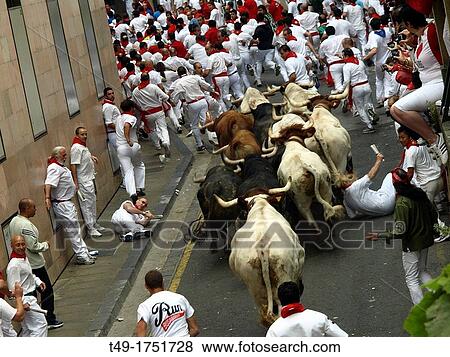 Stock Photo - running of the bulls in San Fermin Pamplona 2012. Fotosearch
