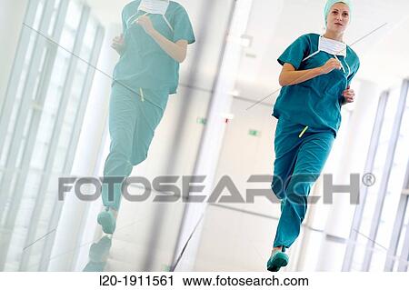 running surgeon in the operating room hallway, Onkologikoa Hospital, Oncology Institute, Case Center for prevention, diagnosis and treatment of cancer, Donostia, San Sebastian, Gipuzkoa, Basque Country, Spain View Large Photo Image Stock Image - running surgeon in the operating room hallway, Onkologikoa Hospital, Oncology Institute, Case Center for prevention, diagnosis and treatment of cancer, Donostia, San Sebastian, Gipuzkoa, Basque Country, Spain. Fotosearch