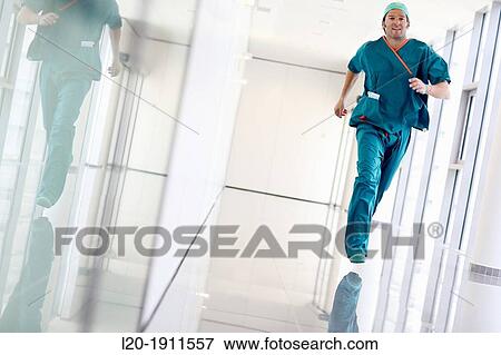 running surgeon in the operating room hallway, Onkologikoa Hospital, Oncology Institute, Case Center for prevention, diagnosis and treatment of cancer, Donostia, San Sebastian, Gipuzkoa, Basque Country, Spain View Large Photo Image Stock Photo - running surgeon in the operating room hallway, Onkologikoa Hospital, Oncology Institute, Case Center for prevention, diagnosis and treatment of cancer, Donostia, San Sebastian, Gipuzkoa, Basque Country, Spain. Fotosearch