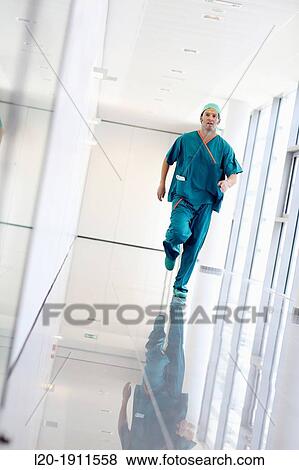running surgeon in the operating room hallway, Onkologikoa Hospital, Oncology Institute, Case Center for prevention, diagnosis and treatment of cancer, Donostia, San Sebastian, Gipuzkoa, Basque Country, Spain View Large Photo Image Stock Photo - running surgeon in the operating room hallway, Onkologikoa Hospital, Oncology Institute, Case Center for prevention, diagnosis and treatment of cancer, Donostia, San Sebastian, Gipuzkoa, Basque Country, Spain. Fotosearch