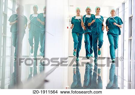 running surgeons in the operating room hallway, Onkologikoa Hospital, Oncology Institute, Case Center for prevention, diagnosis and treatment of cancer, Donostia, San Sebastian, Gipuzkoa, Basque Country, Spain View Large Photo Image Picture - running surgeons in the operating room hallway, Onkologikoa Hospital, Oncology Institute, Case Center for prevention, diagnosis and treatment of cancer, Donostia, San Sebastian, Gipuzkoa, Basque Country, Spain. Fotosearch