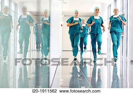 running surgeons in the operating room hallway, Onkologikoa Hospital, Oncology Institute, Case Center for prevention, diagnosis and treatment of cancer, Donostia, San Sebastian, Gipuzkoa, Basque Country, Spain View Large Photo Image Stock Image - running surgeons in the operating room hallway, Onkologikoa Hospital, Oncology Institute, Case Center for prevention, diagnosis and treatment of cancer, Donostia, San Sebastian, Gipuzkoa, Basque Country, Spain. Fotosearch