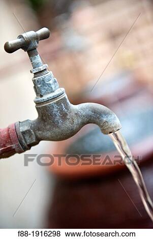 Running tap View Large Photo Image Stock Photo - Running tap. Fotosearch