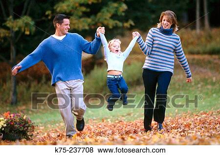 Running with daughter View Large Photo Image Stock Photo - Running with daughter. Fotosearch