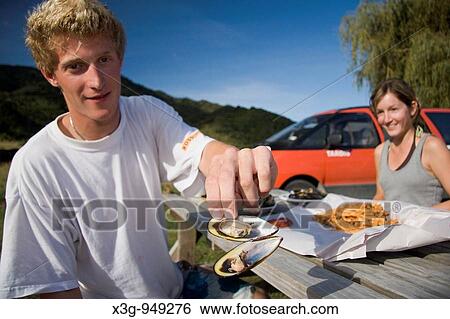 Stock Photograph - Rural camping life on the Abel Tasman National Park, South Island, New Zealand. Fotosearch