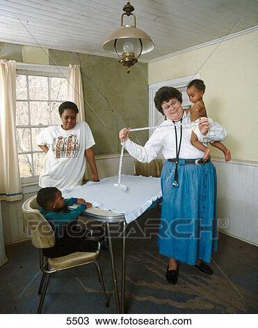 Rural doctor and family View Large Photo Image Stock Image - Rural doctor and family. Fotosearch