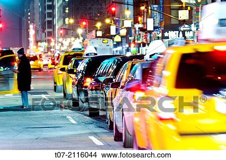 Rush Hour mass transit traffic, Public Transportation, Yellow Taxis, Herald Square, 34th Street, Midtown Manhattan, Broadway, Fashion District, New York City, USA. View Large Photo Image Picture - Rush Hour mass transit traffic, Public Transportation, Yellow Taxis, Herald Square, 34th Street, Midtown Manhattan, Broadway, Fashion District, New York City, USA.. Fotosearch