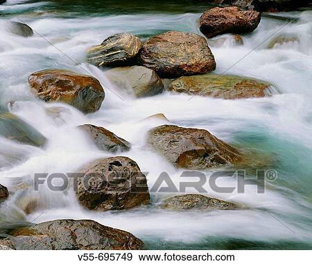 Stock Photo - Rushing spring runoff in Sauk River, Washington State, USA. Fotosearch