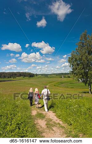 Stock Photo - Russia, Pskovskaya Oblast, Pushkinskie Gory, visitors, NR, to Mikhailovskoye, the Alexander Pushkin Preserve, estate of famous Russian poet. Fotosearch