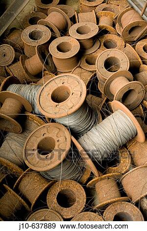 Rusted wire spools, Gilbert & Bennett wire mill, Georgetown, Connecticut. USA. View Large Photo Image Stock Photo - Rusted wire spools, Gilbert & Bennett wire mill, Georgetown, Connecticut. USA.. Fotosearch