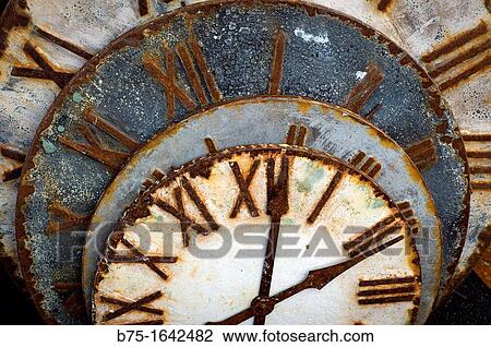 rusty old watch dials in a market of second hand items View Large Photo Image Stock Image - rusty old watch dials in a market of second hand items. Fotosearch