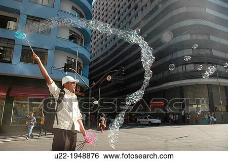 S? o Paulo, Brazil, a man selling soap bubbles in the city center View Large Photo Image Stock Photograph - S? o Paulo, Brazil, a man selling soap bubbles in the city center. Fotosearch