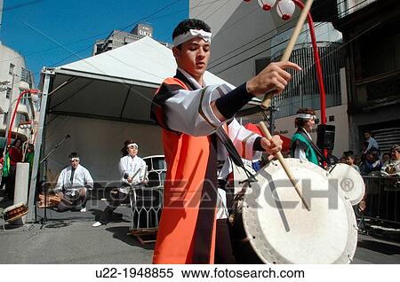 Stock Photography - S? o Paulo, Brazil, taiko drums show in the Asian neighborhood of Liberdade, during the Japanese festival of Bunka Matsuri, in May. Fotosearch