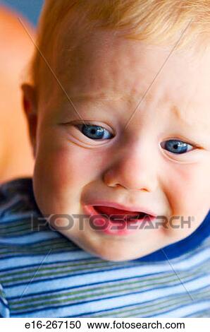 Stock Image - sad infant. Fotosearch