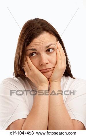 sad looking young woman brown hair and eyes with her head in her hands View Large Photo Image Stock Image - sad looking young woman brown hair and eyes with her head in her hands. Fotosearch
