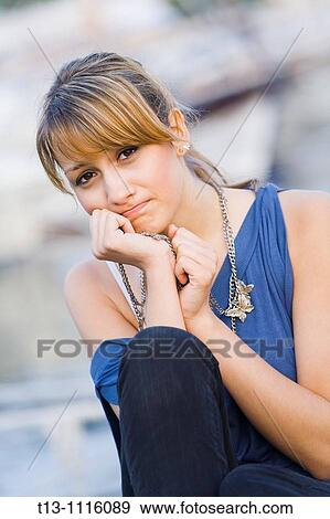 Sad young woman portrait View Large Photo Image Stock Photo - Sad young woman portrait. Fotosearch