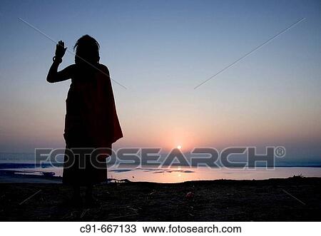 Sadhu at dawn, Allahabad. Uttar Pradesh, India View Large Photo Image Stock Image - Sadhu at dawn, Allahabad. Uttar Pradesh, India. Fotosearch