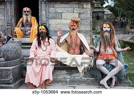 Sadhu covered with traditional ash and body paint At Pashupatinath Temple Kathmandu Valley Nepal View Large Photo Image Picture - Sadhu covered with traditional ash and body paint At Pashupatinath Temple Kathmandu Valley Nepal. Fotosearch
