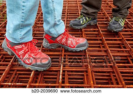Safety footwear. Construction works. Donostia. San Sebastian. Gipuzkoa. Basque Country. Spain. View Large Photo Image Stock Image - Safety footwear. Construction works. Donostia. San Sebastian. Gipuzkoa. Basque Country. Spain.. Fotosearch