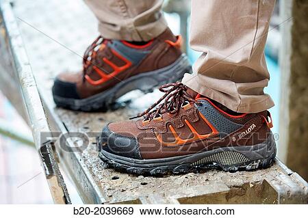 Stock Photo - Safety footwear. Construction works. Donostia. San Sebastian. Gipuzkoa. Basque Country. Spain.. Fotosearch