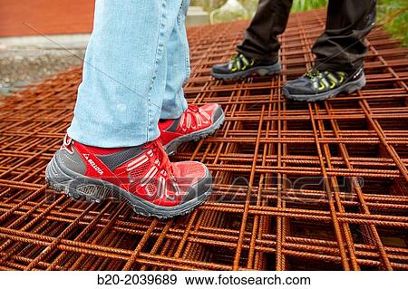 Safety footwear. Construction works. Donostia. San Sebastian. Gipuzkoa. Basque Country. Spain. View Large Photo Image Stock Photo - Safety footwear. Construction works. Donostia. San Sebastian. Gipuzkoa. Basque Country. Spain.. Fotosearch