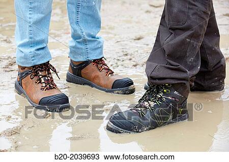 Stock Image - Safety shoes waterproof. Construction works. Donostia. San Sebastian. Gipuzkoa. Basque Country. Spain.. Fotosearch
