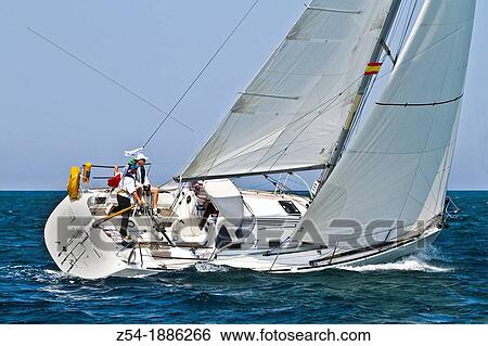 Stock Photograph - Sailboat in a competition race, Gij? n, Asturias, Spain. Fotosearch