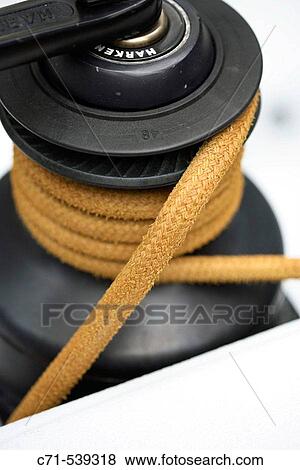 Stock Photo - Sailboat pulley with rope. Fotosearch