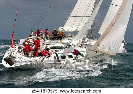 Sailboats in a competition race, Gij? n, asturias, Spain View Large Photo Image Stock Photography - Sailboats in a competition race, Gij? n, asturias, Spain. Fotosearch