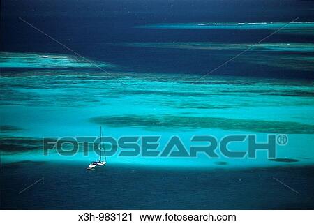Stock Image - sailing boat lied at anchor, Mayreau, Grenadines islands, Saint Vincent and the Grenadines, Winward Islands, Lesser Antilles, Caribbean Sea. Fotosearch