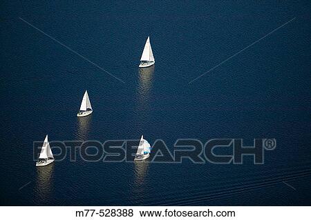 Sailing boats in the lake V? ttern, aerial view, Askersund. Lake V? ttern, N? rke, Sweden View Large Photo Image Stock Photo - Sailing boats in the lake V? ttern, aerial view, Askersund. Lake V? ttern, N? rke, Sweden. Fotosearch