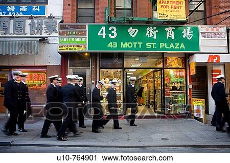 Stock Image - Sailors visiting Chinatown, New York City. Fotosearch
