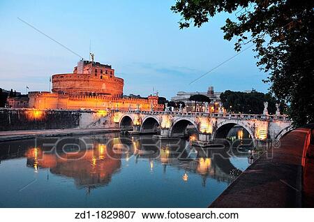 Saint Angelo castle and bridge at night, beautiful old sculptures and lanterns in Rome, Italy View Large Photo Image Stock Photo - Saint Angelo castle and bridge at night, beautiful old sculptures and lanterns in Rome, Italy. Fotosearch