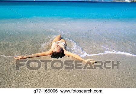 Saint Barthelemy, Caribbean, woman on beach at Colombier Bay View Large Photo Image Stock Photograph - Saint Barthelemy, Caribbean, woman on beach at Colombier Bay. Fotosearch