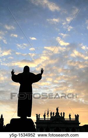 Saint francis of Assisi statue and san giovanni basilica church at sunset in rome View Large Photo Image Stock Image - Saint francis of Assisi statue and san giovanni basilica church at sunset in rome. Fotosearch